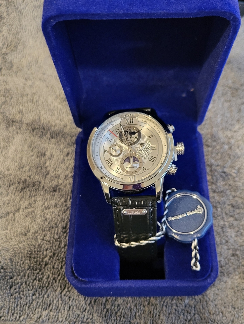 Thompson Silver Dial Men’s Watch with Black Leather Strap